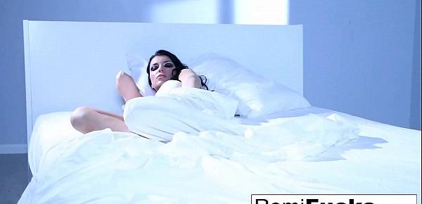  Solo fun on the bed with the busty pornstar Romi Rain